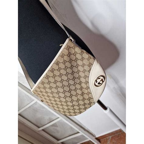 gucci britta cross bag|Gucci clutch bag.